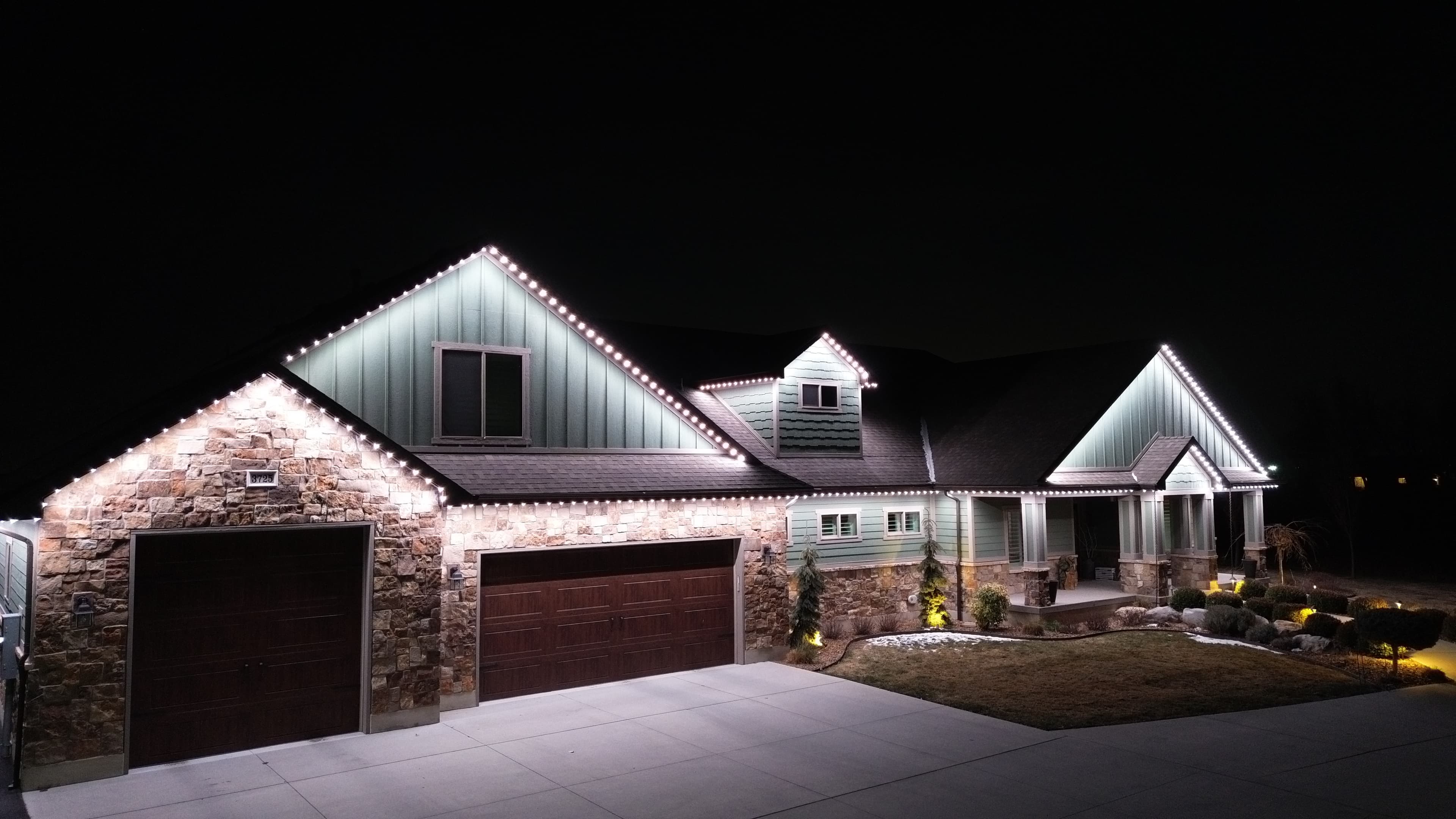 Security lighting illuminating a Houston-area home at night